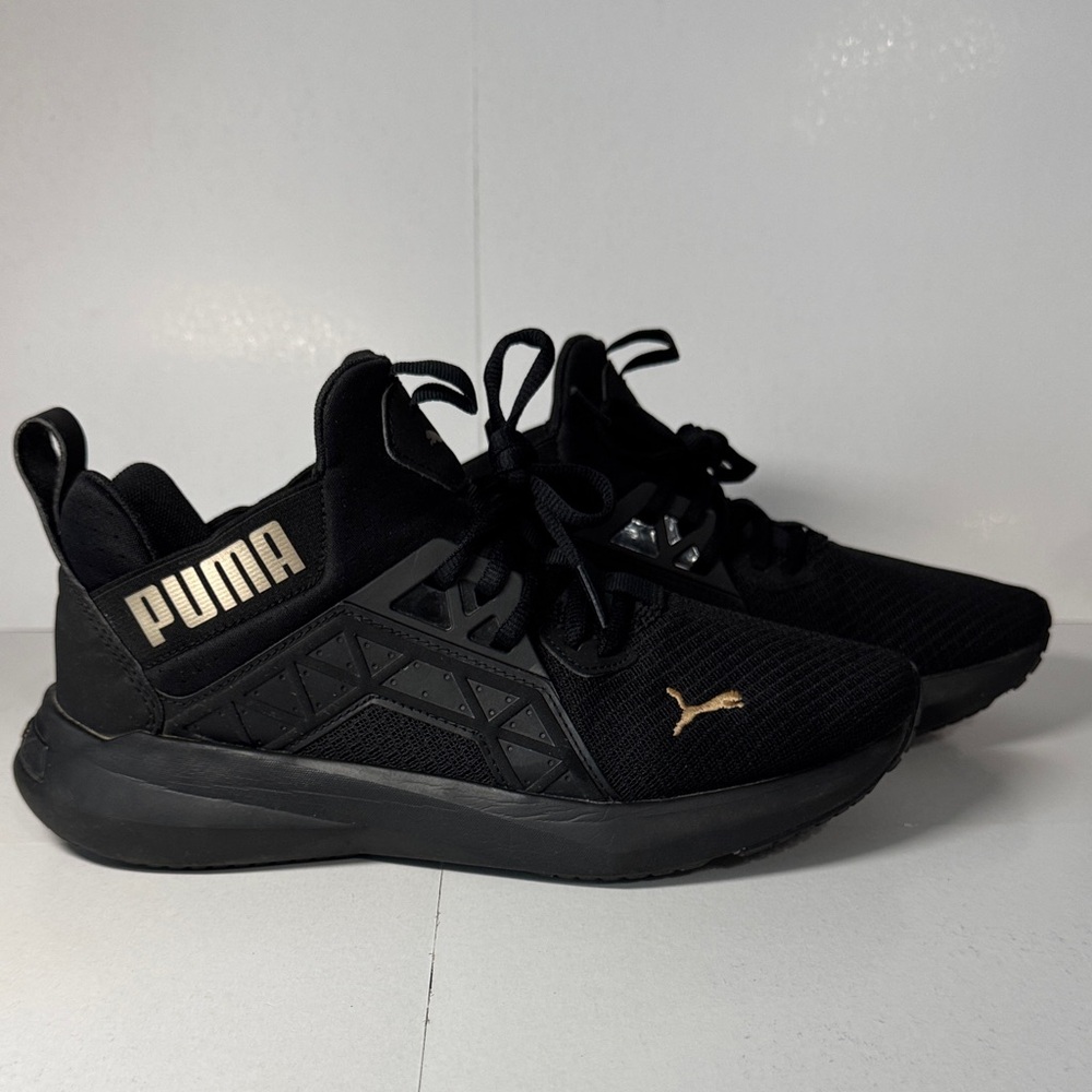 Puma Black Sneakers with Gold Highlights